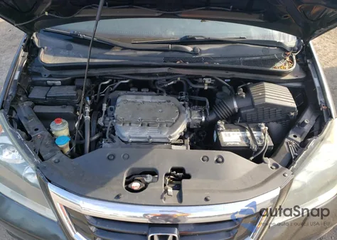 2010 Honda Odyssey Touring z USA, uszkodzony, nr VIN 5FNRL3H91AB091110